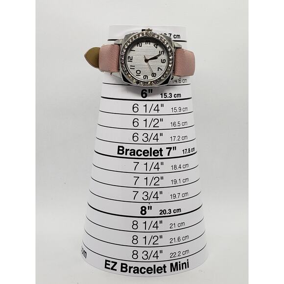 Women\'s dress watch 9357. Silver iridescent face, Jeweled bevel with pink band